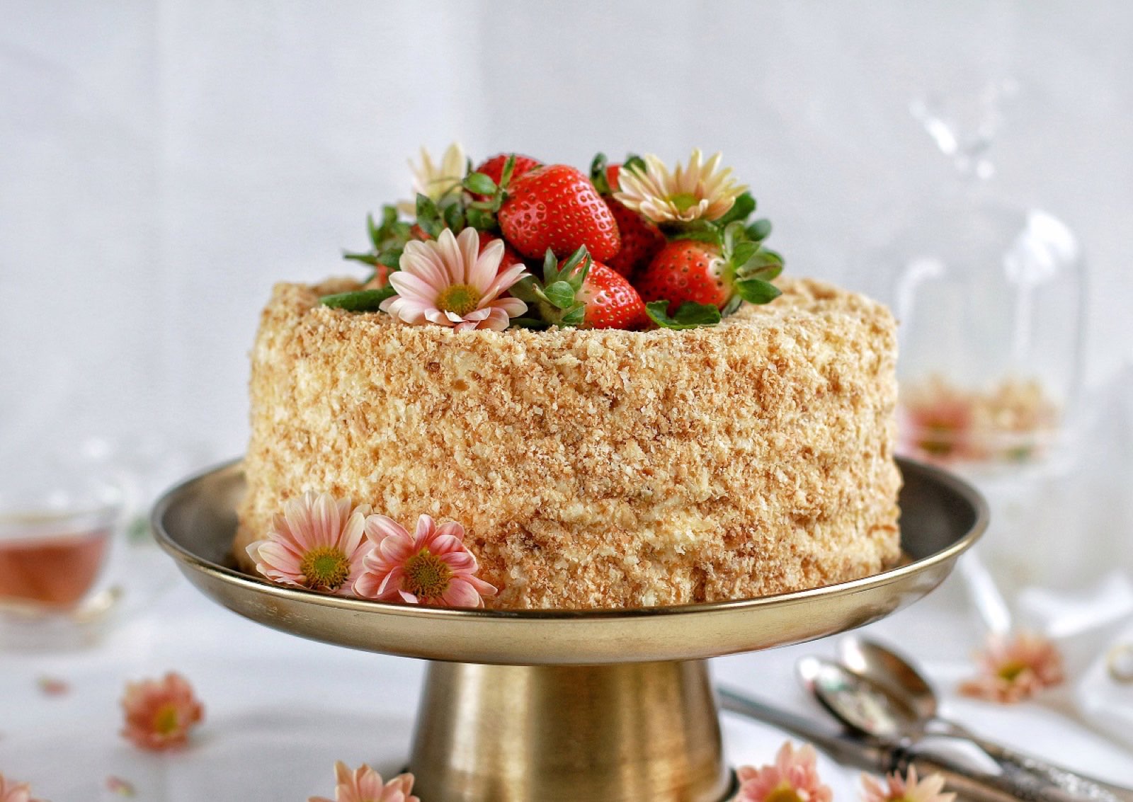 Napoleon cake with strawberries on a cake stand